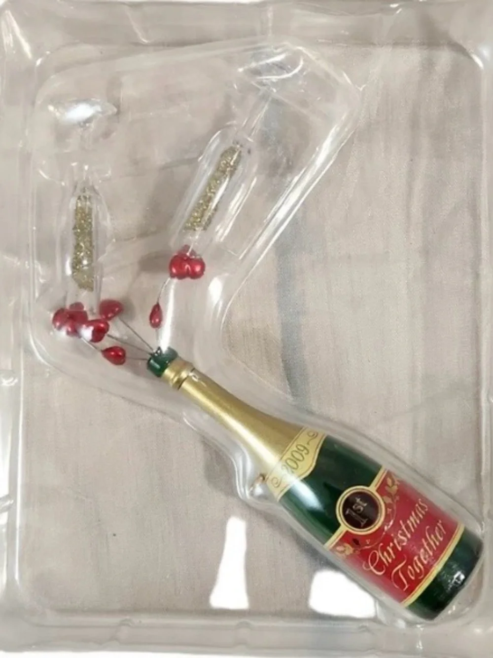 Hallmark Keepsake Champagne Bottle Ornament in Gold, Red, Green